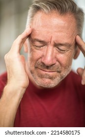 Older Man Having A Severe Headache.￼