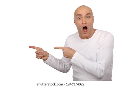 Older Man Looking Surprised And Pointing In One Direction 