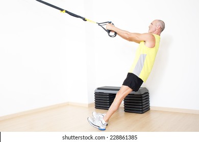 Older Man Making Suspension Training