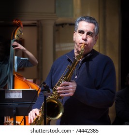 Older Man Playing Sax