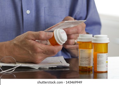 Older man with prescription medications. - Powered by Shutterstock