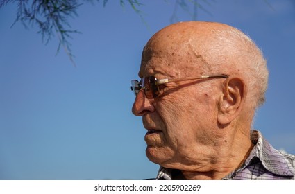 Older Man In Profile Looking With The Emotion Of Surprise