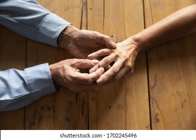 Older Man Putting Engagement Ring On Woman Finger Close Up, Making Marriage Proposal, Symbol Of Love, Mature Couple Making Decision About Divorce Or Break Up, Husband Taking Off Ring From Wife Hand