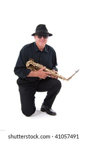 Older Man With A Sax Isolated On White