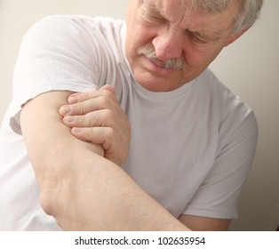 An Older Man Suffers From Soreness In His Upper Arm