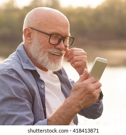 Older Man Using A Smartphone