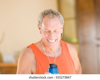 Older Man Working Out At Home