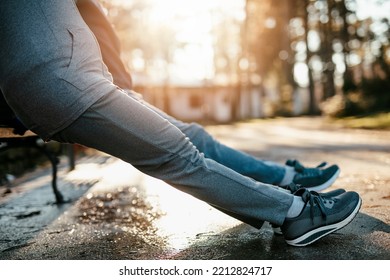 An Older Married Couple Enjoys Exercising And Jogging On A Beautiful Sunny Winter Day.