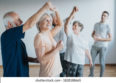 Older people dancing with their partners on a dancing course - Powered by Shutterstock