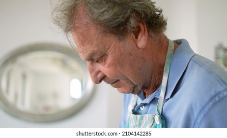 Older Person Cooking Preparing Meal At Home