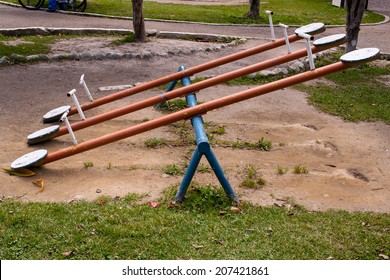 Older playground equipment in Ecuador, teeter-totter, seesaw