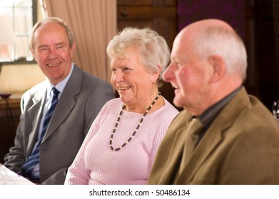 Older Senior Couples Sitting In Smart Restaurant