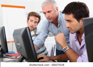 Older Students Using Computers In The Classroom