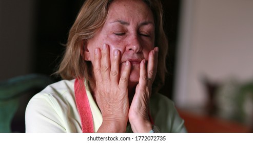 
Older Woman Feeling Stress And Pain, Anxious Person Covering Face With Hands Feeling Anxiety