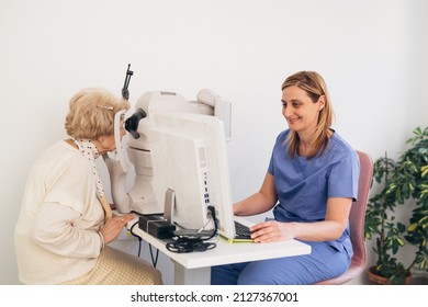 Older Woman Has Eye Examination. Digital Retina Scanner