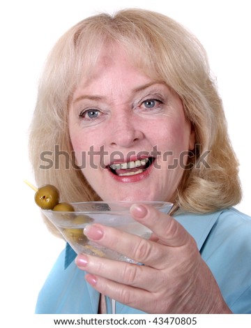 Older woman holding a martini