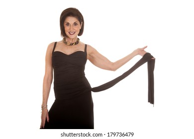 An Older Woman Holding On To A Piece Of Her Dress With A Smile.