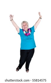 Older woman laughs and waves her hands in the air with success