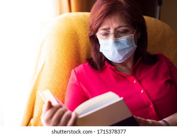 Older Woman Reading The Bible With Medical Mask By Covid-19