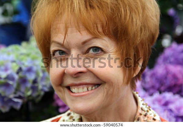 Older Woman Red Hair Smiles Stock Photo Edit Now 59040574