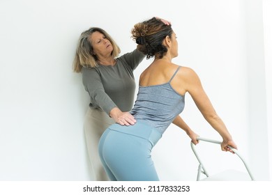 Older Woman, Yoga Teacher, Setting Up Correct Back Positions, Stretches And Spinal Health