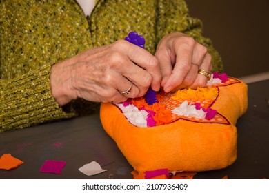 Older Woman's Hands Working On Fox Plush Pillow Craft Punch Needle