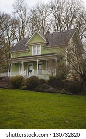 Old-fashioned Farm House With A Porch