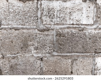 Old-fashioned white brick wall texture. Close up. Grey background texture. Grey brick close up