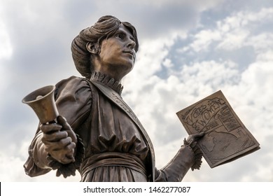 OLDHAM, UK - July 25, 2019: Statue Of Annie Kenny Political Activist And Homegrown Suffragette For The Women's Social And Political Union In The Centre Of Oldham, England.