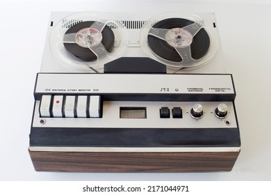 Old-style Reel-to-reel Tape Recorder, With Inscriptions (record, Stop, Play, Volume, Network, Level,) Selective Focus, Close-up On A White Background