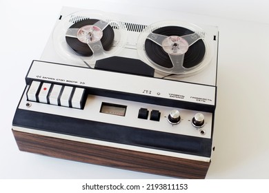 Old-style Reel-to-reel Tape Recorder, With Inscriptions (record, Stop, Play, Volume, Network, Level,) Selective Focus, Close-up On A White Background