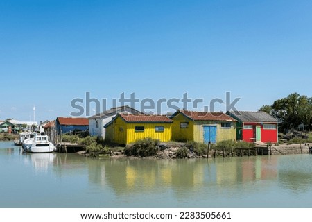 Oleron island in Charente-Maritime, France. Old fishermen’s huts in the port of Château d’Oleron