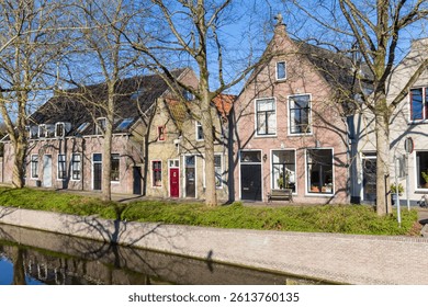 Olg houses at the canal in the center of Oudewater, Netherlands