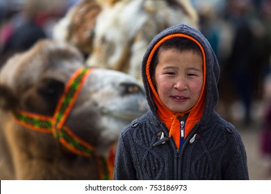 OLGIY, MONGOLIA - SEP 30, 2017: Unidentified Mongolian Child During Annual National Competition With Birds Of Prey 