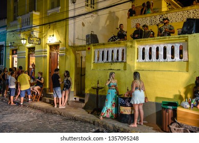 Olinda, Brazil - 26 January 2019: People Drinking Outside The Shop Of Bodega De Veio At Olinda In Brazil