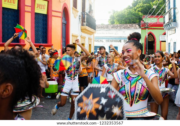 Olinda,\
Pernambuco, Brazil, in February 2017. Culture Popular. Frevo:\
manifestation of the popular culture of Pernambuco. Passistas de\
frevo presenting a performance in Quatros\
Cantos.