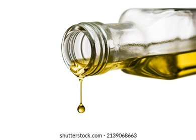 Olive oil bottle with drippind oil isolated on white background - Powered by Shutterstock