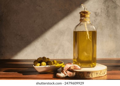 Olive oil bottle with olives and garlic - Powered by Shutterstock