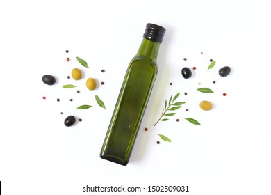 Olive Oil In A Bottle On A White Background Top View.
