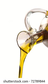 Olive Oil Pouring From A Bottle