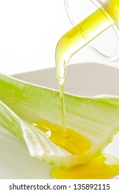 Olive Oil Pouring Into Celery