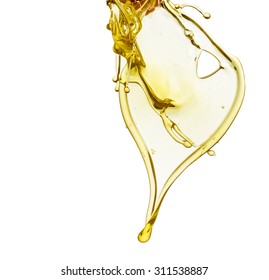 Olive oil splash isolated on white background.