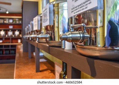 An Olive Oil Store Has Many Containers For Tasting The Oils