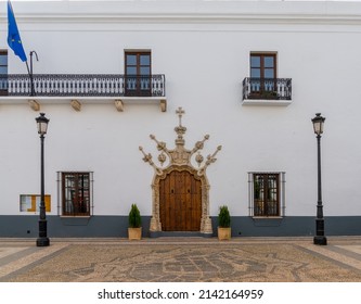 Olivenza, Spain - 27 March, 2022: the historic town hall in Olivenza with its ornate stonework arch and door