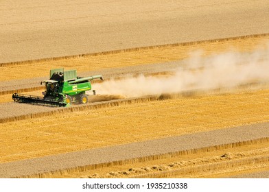 olivet, France - 13 mars 2021 : harvesting cereals using mechanical devices