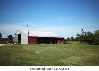 Olney, Illinois - May 17 2015: A Red Barn On A Farm.