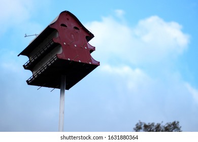 Olney, Illinois - May 18 2015: A Bird Feeder In The Shape Of A Red Barn.