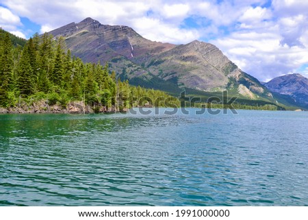 Olson Mountain and ripples across Upper Waterton Lake at Glacier National Park during Summer