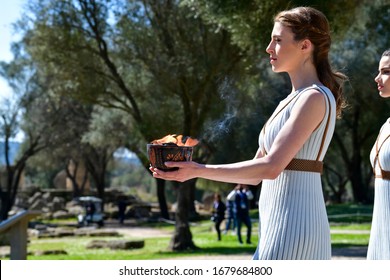 Olympia, Greece -  March 12, 2020: Olympic Flame Handover Ceremony For The Tokyo 2020 Summer Olympic Games At The Ancient Olympia Site, Birthplace Of The Ancient Olympics In Southern Greece.