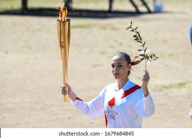 Olympia, Greece -  March 12, 2020: Olympic Flame Handover Ceremony For The Tokyo 2020 Summer Olympic Games At The Ancient Olympia Site, Birthplace Of The Ancient Olympics In Southern Greece.